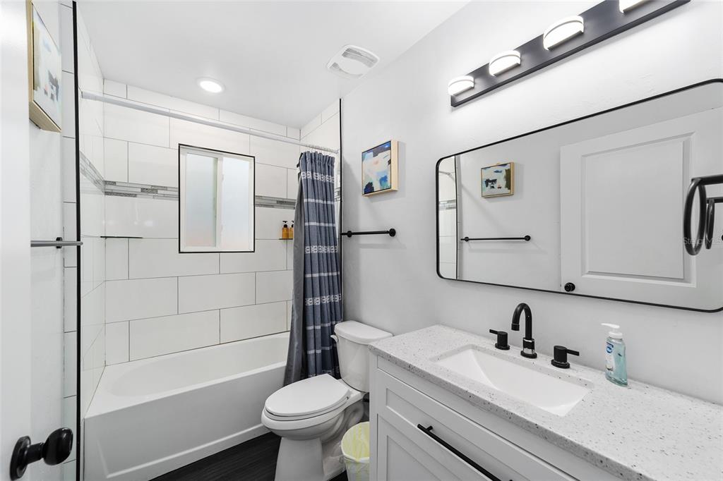 16668 Northwest 191st Way High Springs, FL 32643 - Photo 20 of 38 a bathroom with a sink toilet and shower