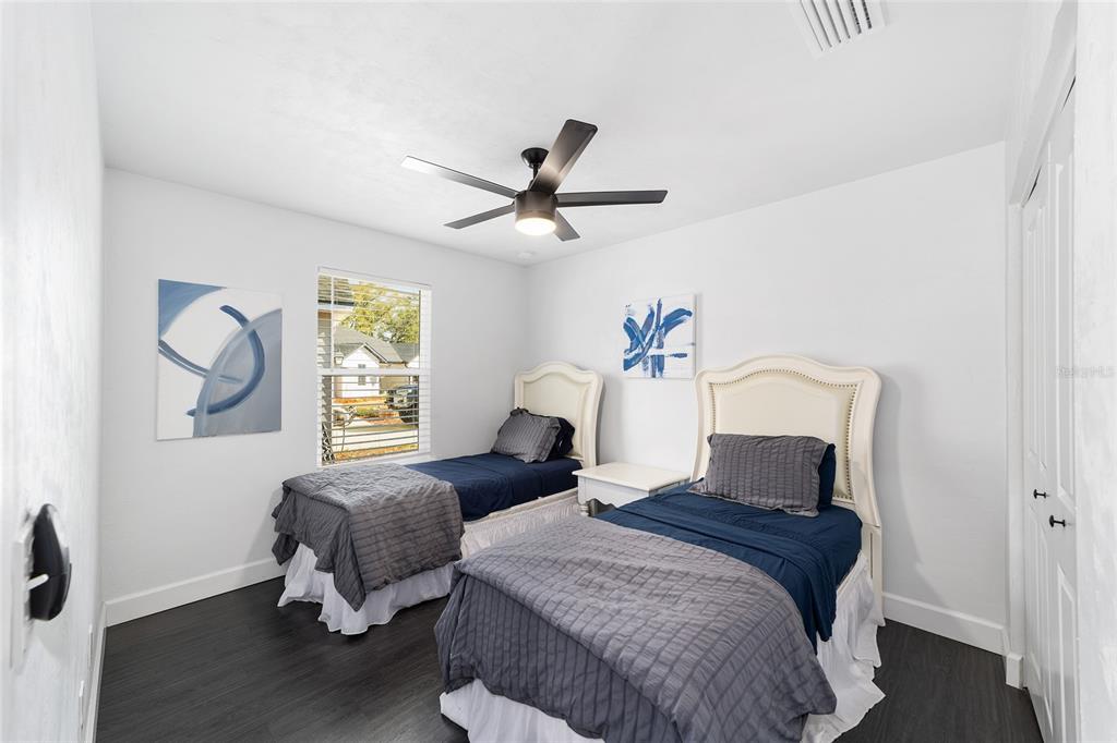 16668 Northwest 191st Way High Springs, FL 32643 - Photo 21 of 38 a bedroom with two beds and a window