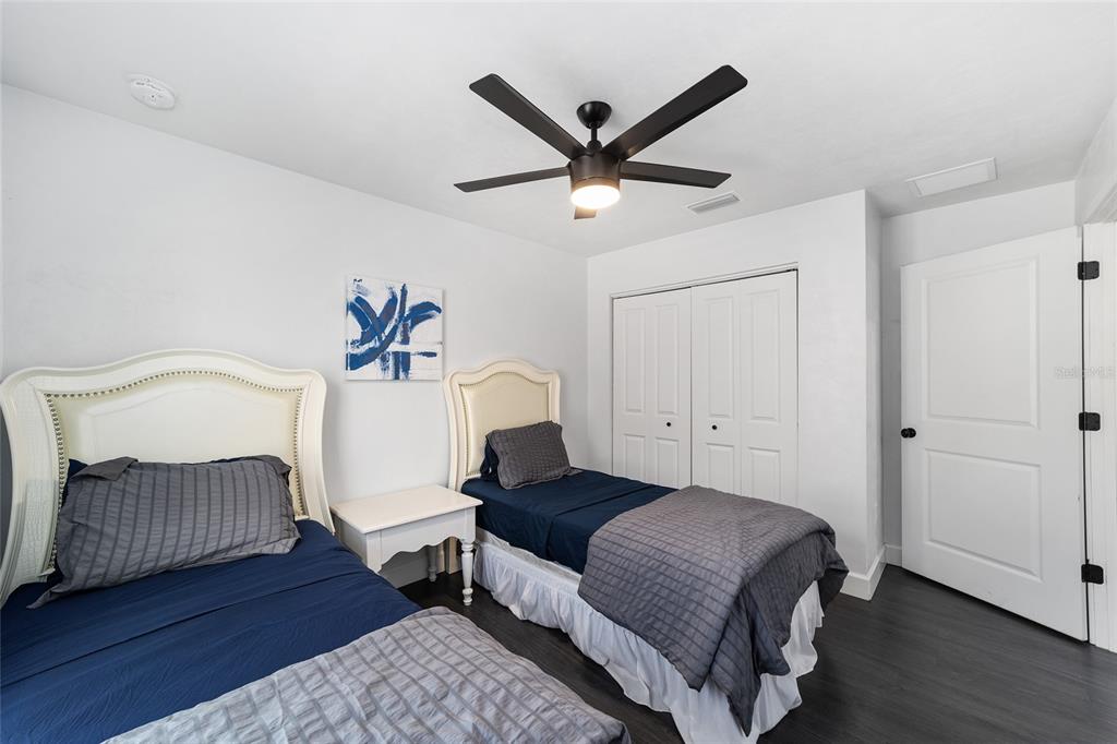 16668 Northwest 191st Way High Springs, FL 32643 - Photo 22 of 38 a living room with a bed furniture and a window