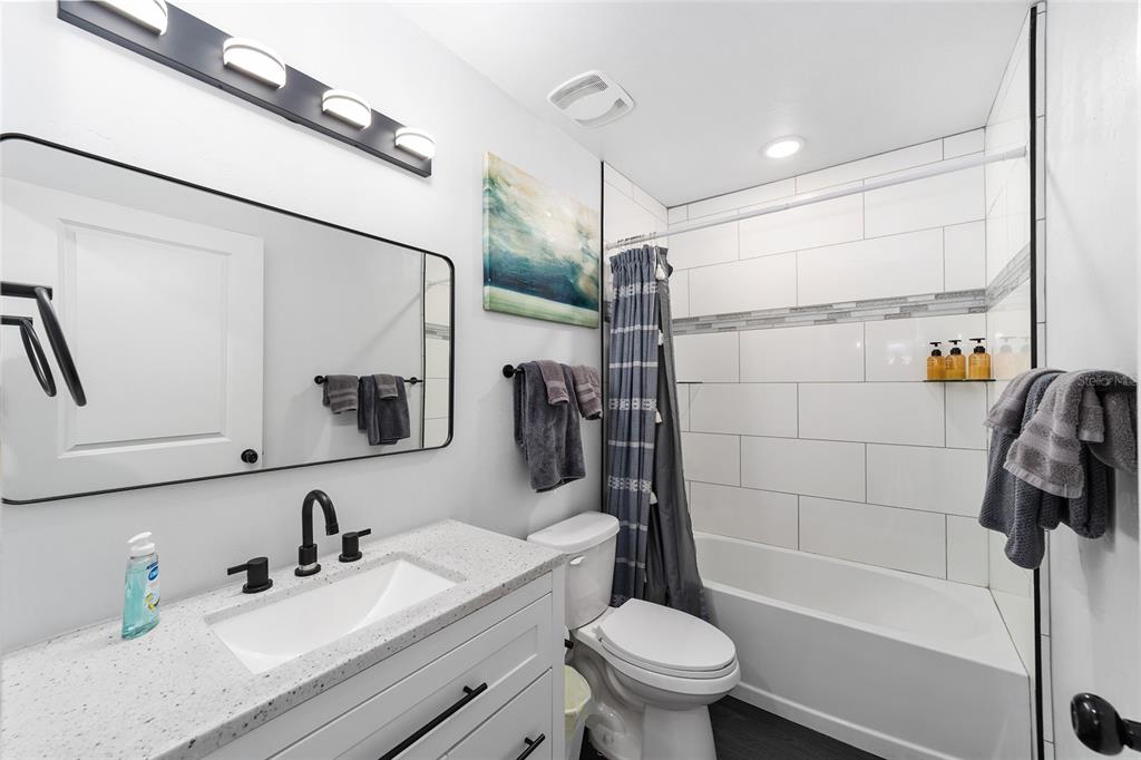 16668 Northwest 191st Way High Springs, FL 32643 - Photo 23 of 38 a bathroom with a sink a toilet and shower