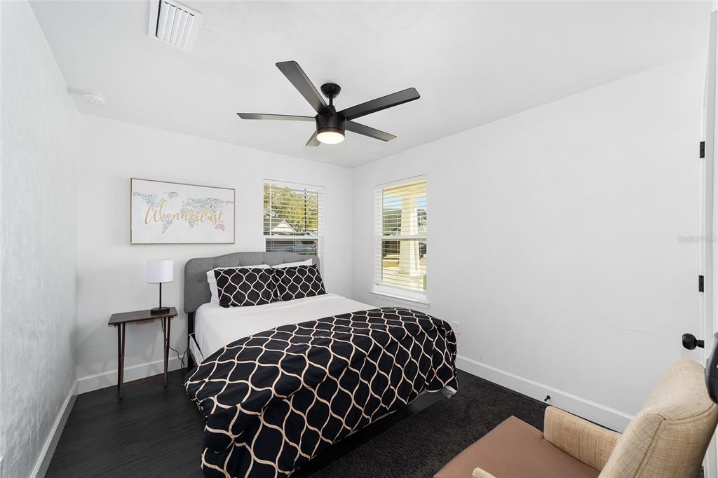 16668 Northwest 191st Way High Springs, FL 32643 - Photo 24 of 38 a bedroom with a bed and window