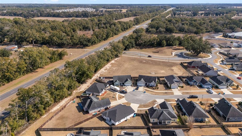 16668 Northwest 191st Way High Springs, FL 32643 - Photo 34 of 38 an aerial view of residential houses with outdoor space