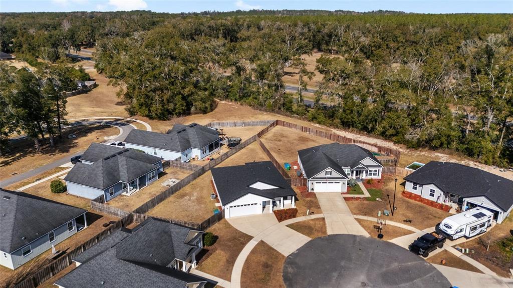 16668 Northwest 191st Way High Springs, FL 32643 - Photo 36 of 38 an aerial view of a house with a yard