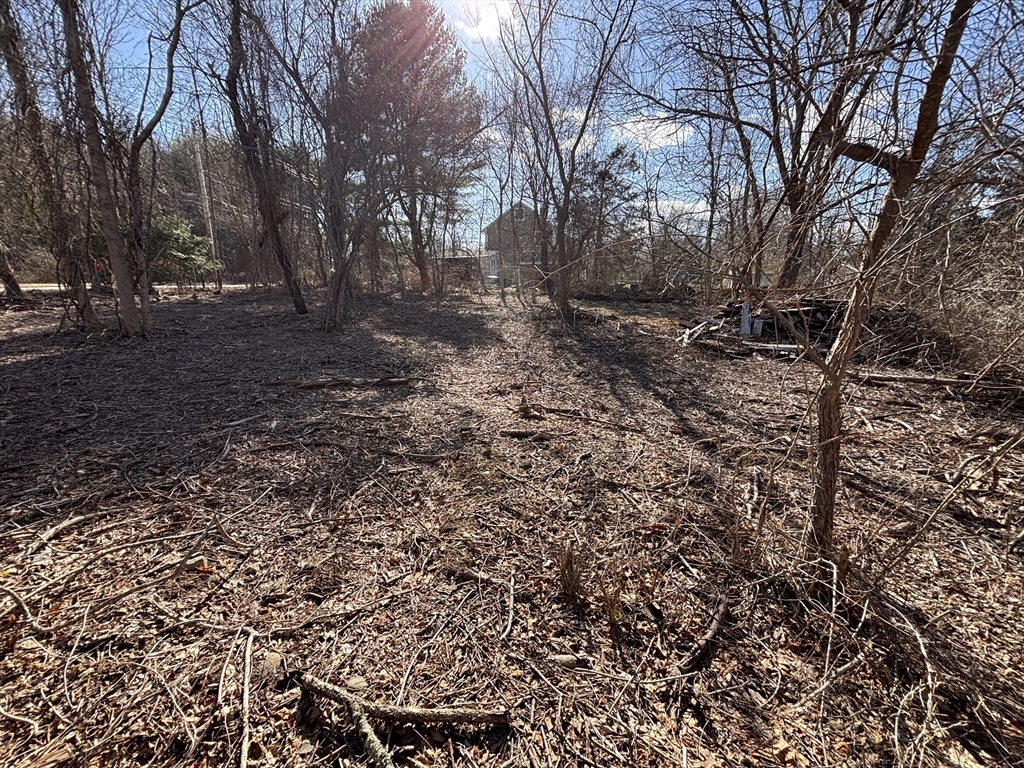 0 Rounseville Road Rochester, MA 02770 - Photo 6 of 10 a backyard of a house with lots of green space