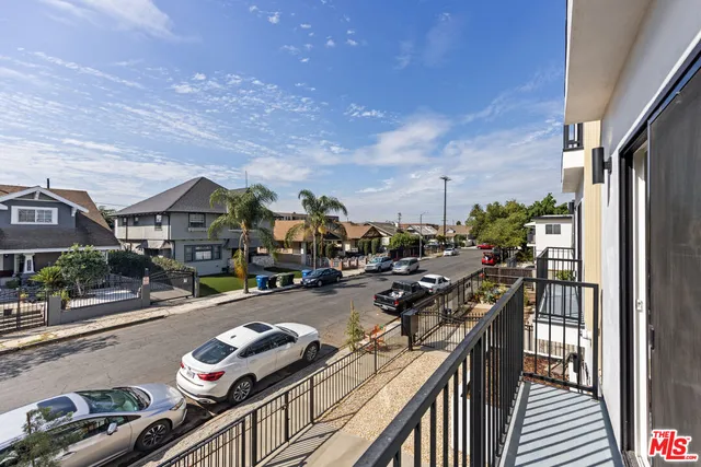a view of a hallway with washer and dryer