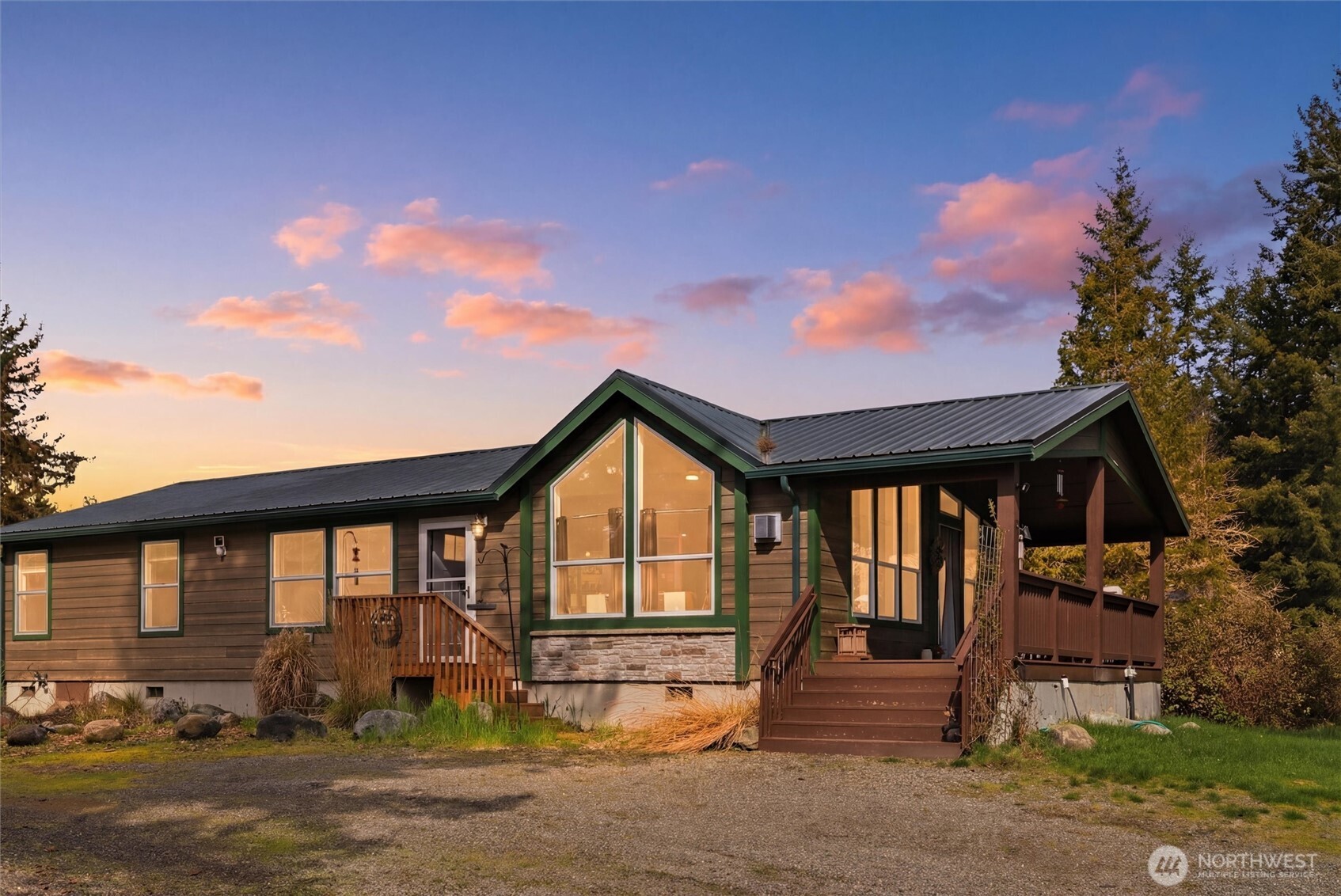 470 Sunshine Drive Sequim, WA 98382 - Photo 1 of 30 a front view of a house with garden