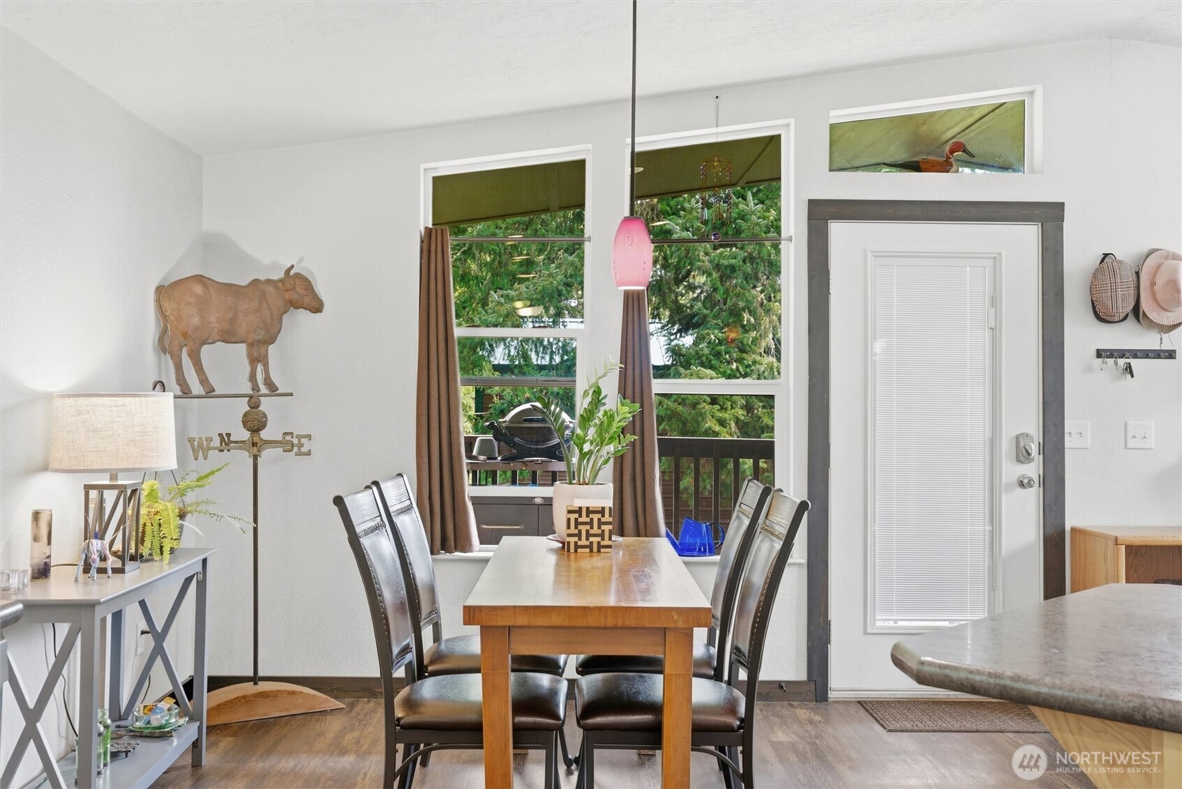 470 Sunshine Drive Sequim, WA 98382 - Photo 13 of 30 a view of a dining room with furniture window and outside view