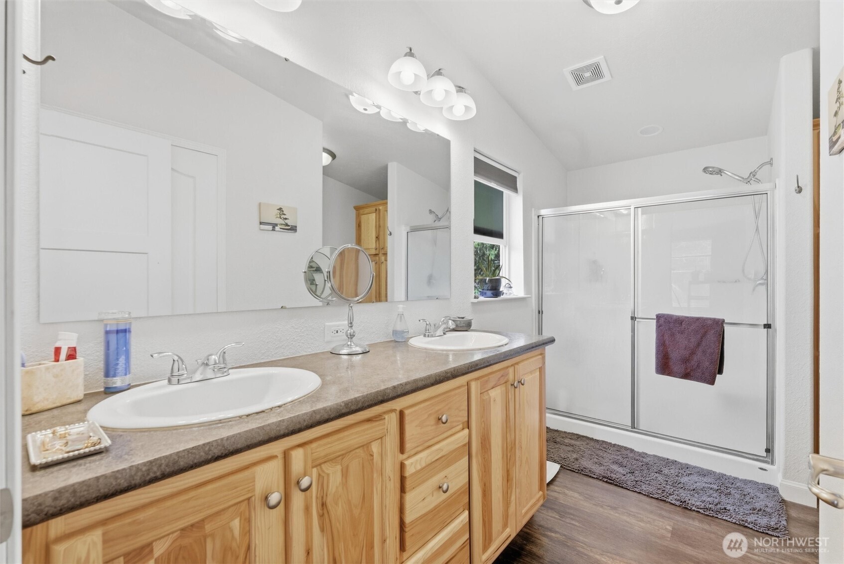 470 Sunshine Drive Sequim, WA 98382 - Photo 21 of 30 a bathroom with a sink double vanity and a mirror