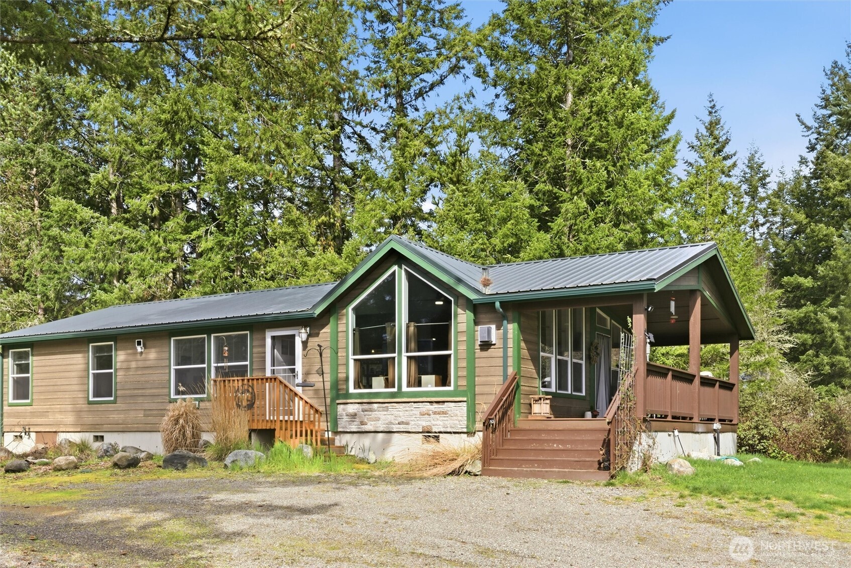 470 Sunshine Drive Sequim, WA 98382 - Photo 7 of 30 a front view of a house with a yard