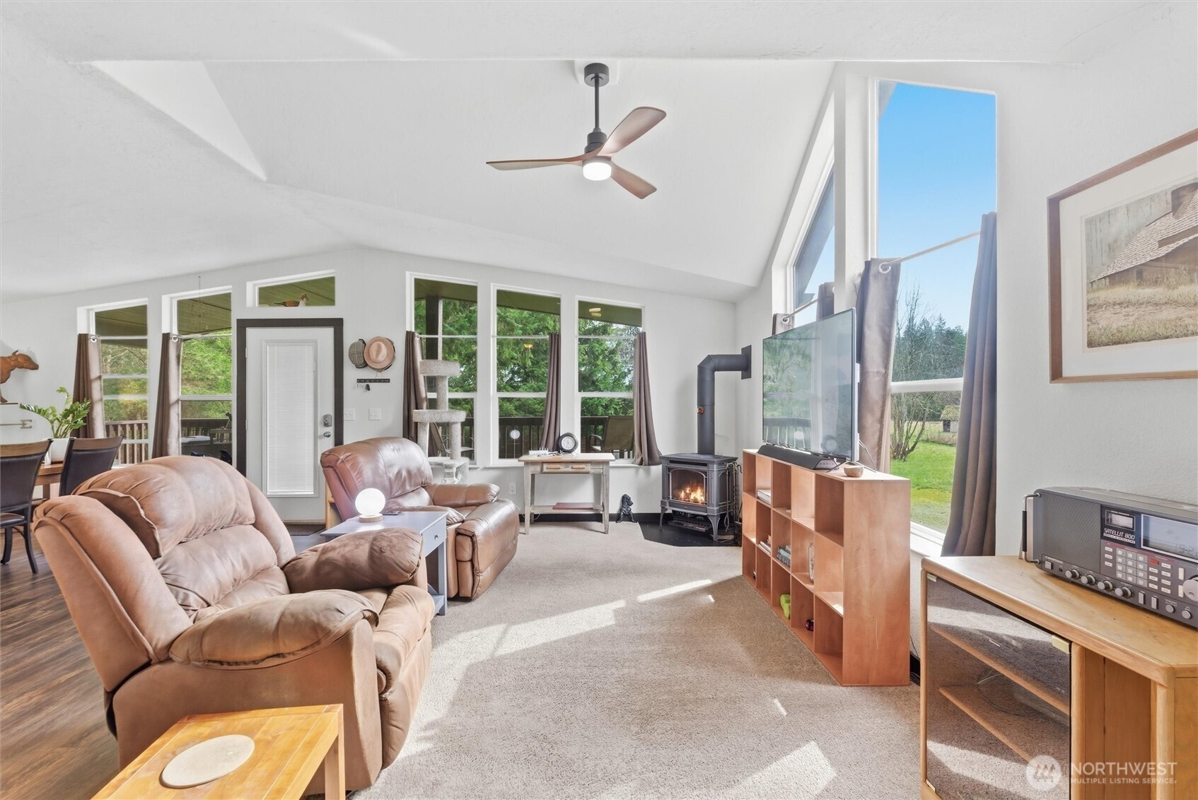 470 Sunshine Drive Sequim, WA 98382 - Photo 10 of 30 a living room with furniture and large windows