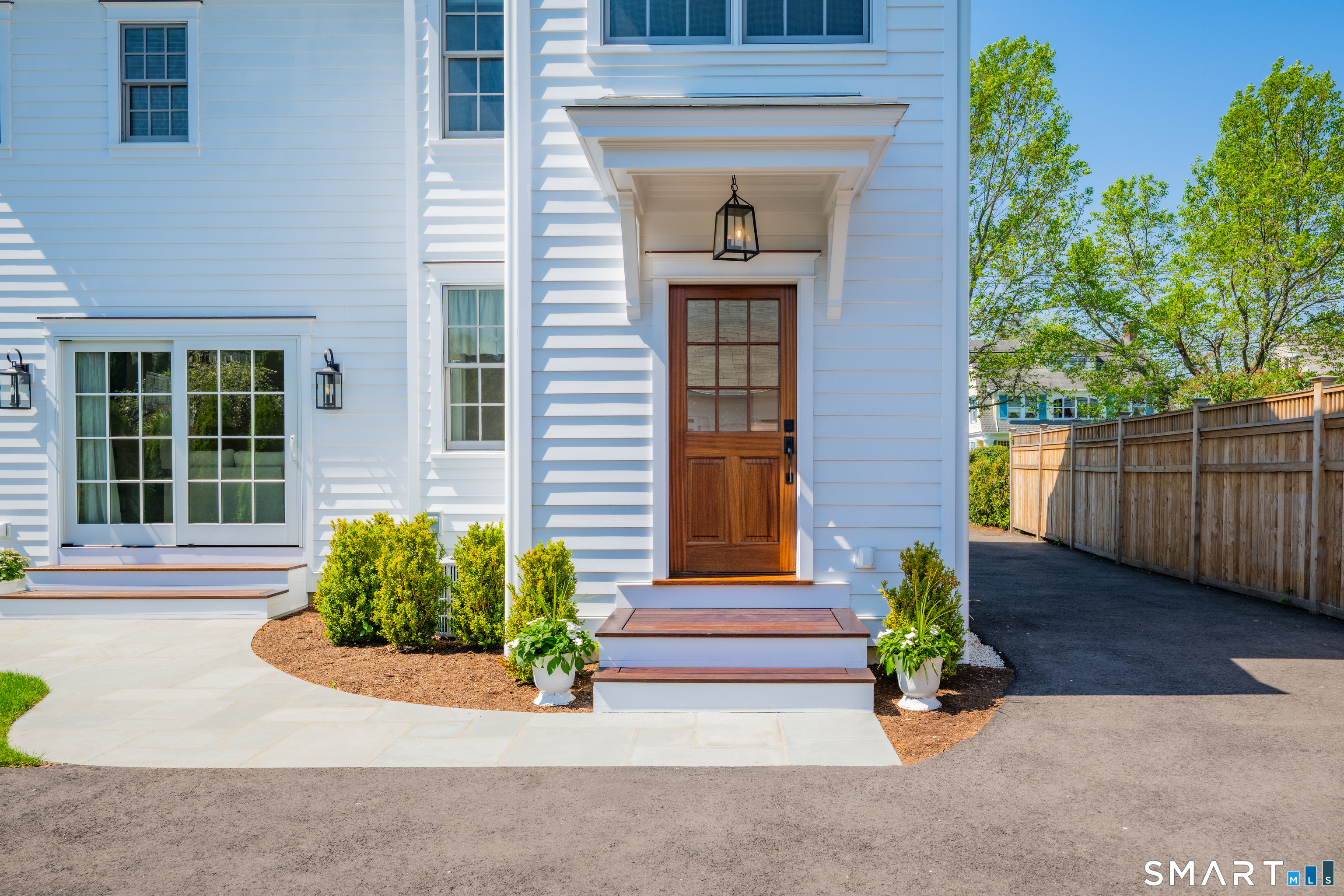 920 Old Post Road Fairfield, CT 06824 - Photo 32 of 40 Such a pretty entrance... convenient for the 2 car garage, large patio and backyard.