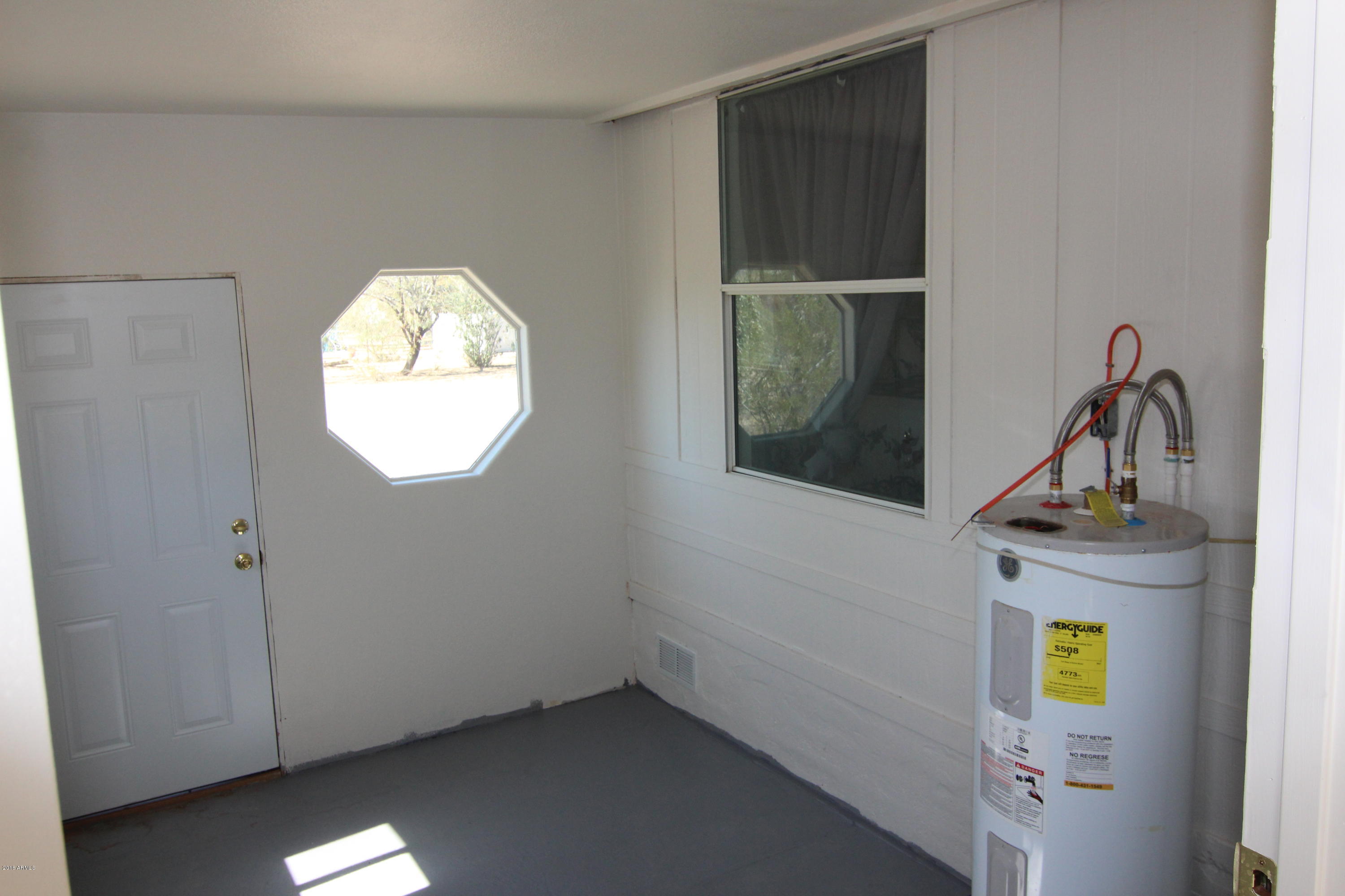 20102 West Arlington Road Buckeye, AZ 85326 - Photo 18 of 66 enclosed utility room heated and cooled