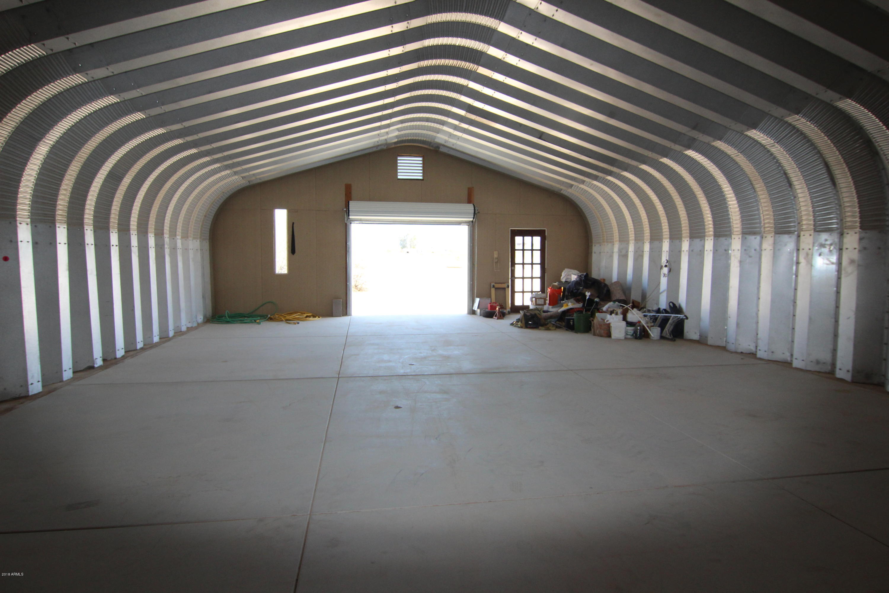 20102 West Arlington Road Buckeye, AZ 85326 - Photo 32 of 66 outbuilding looking inside out