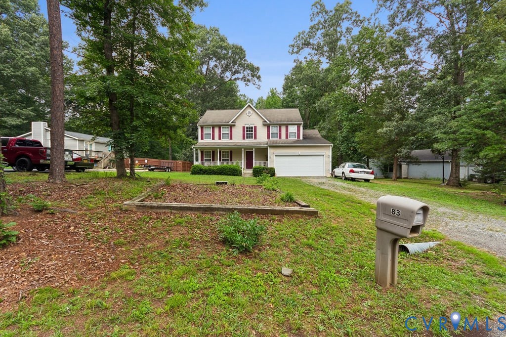 83 Albertson Court Ruther Glen, VA 22546 - Photo 1 of 25 Two-story residence featuring a two-car garage, fr