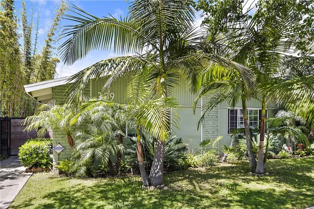 a view of swimming pool with a garden