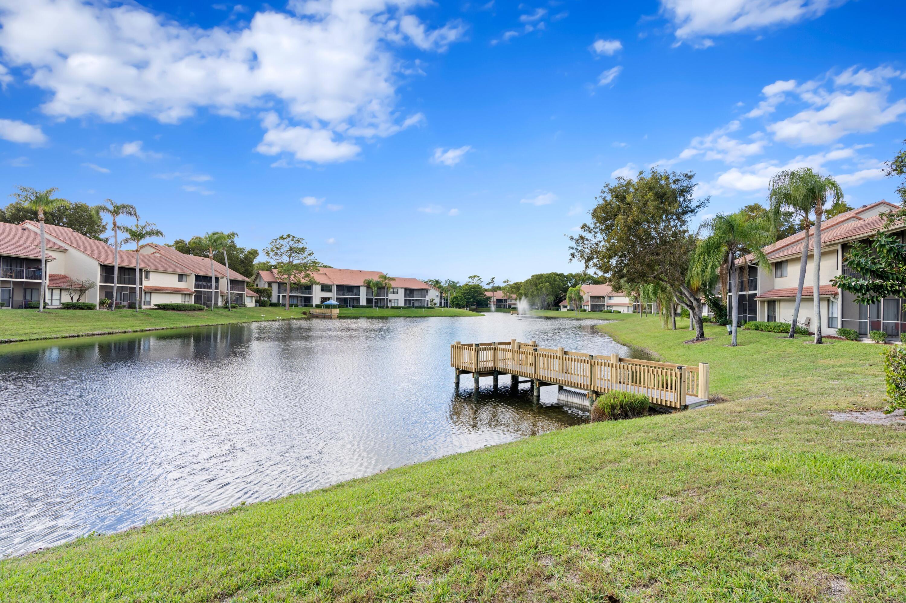 5631 Coach House Circle, Unit H Boca Raton, FL 33486 - Photo 2 of 29 Lake & Dock
