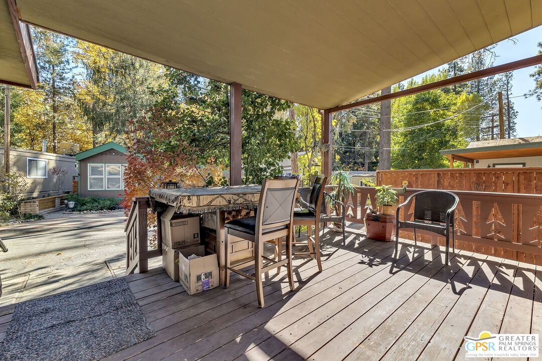 25955 Highway 243, Unit 18 Idyllwild, CA 92549 - Photo 12 of 43 a view of a patio with wooden floor