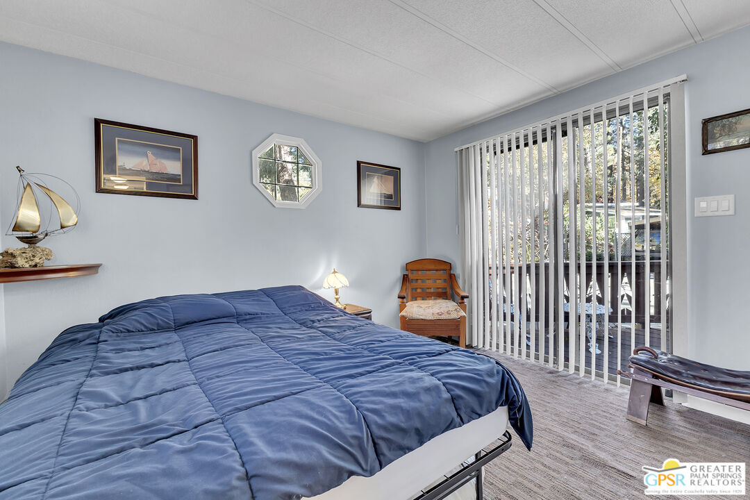25955 Highway 243, Unit 18 Idyllwild, CA 92549 - Photo 27 of 43 a bedroom with a bed and a window