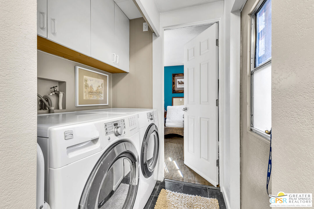 25955 Highway 243, Unit 18 Idyllwild, CA 92549 - Photo 31 of 43 a view of storage and utility room with washer and dryer