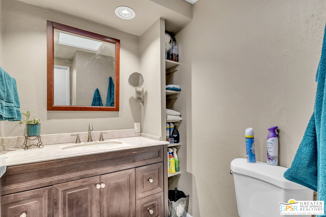 25955 Highway 243, Unit 18 Idyllwild, CA 92549 - Photo 35 of 43 a bathroom with a sink vanity and toilet