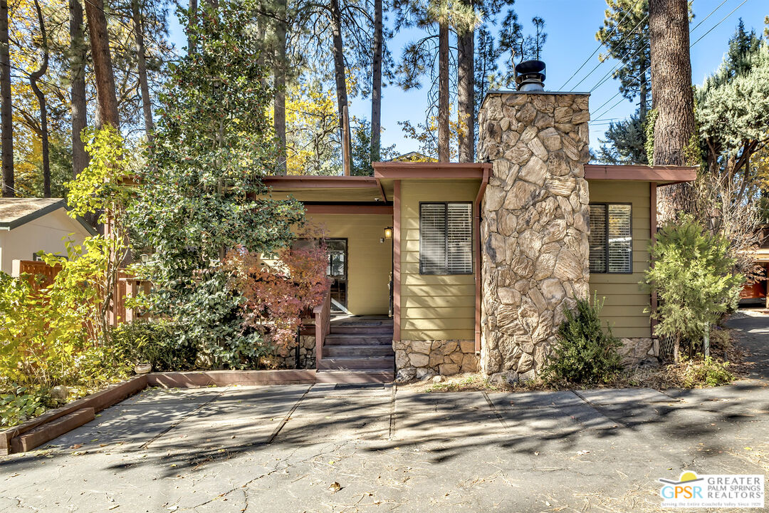 25955 Highway 243, Unit 18 Idyllwild, CA 92549 - Photo 4 of 43 a view of a house with a tree