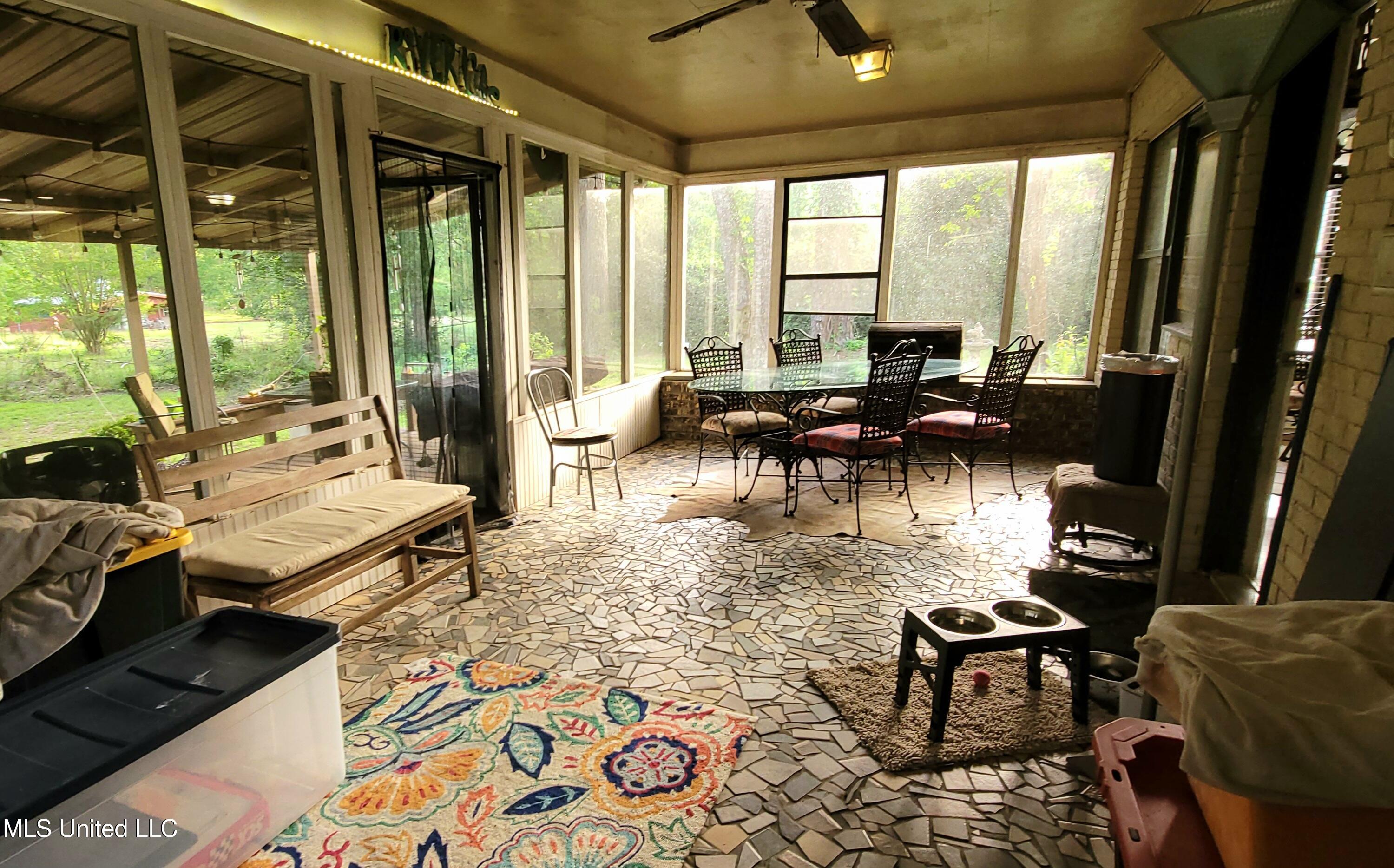 415 St Augustine Drive Madison, MS 39110 - Photo 40 of 52 Screened in porch off den