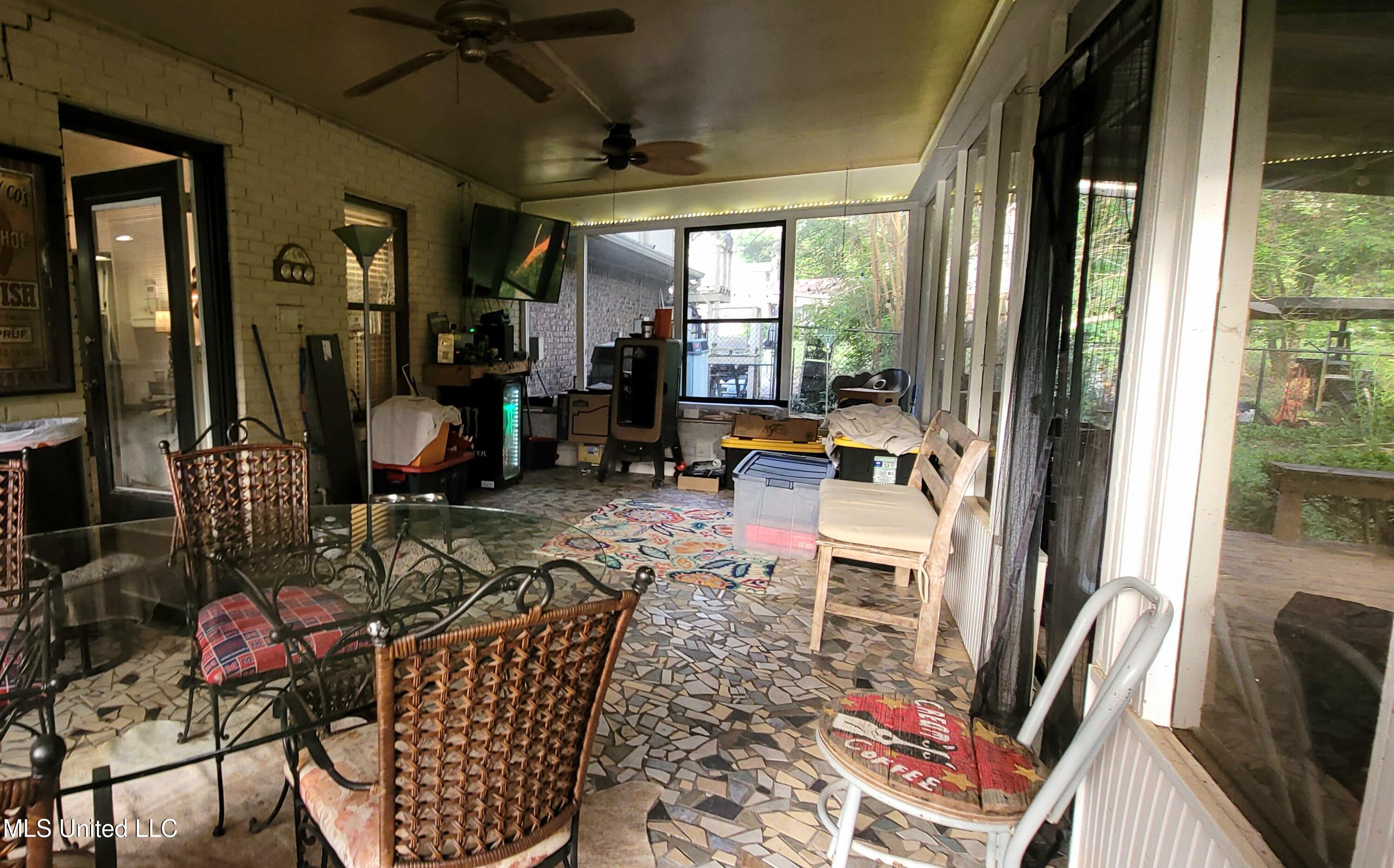 415 St Augustine Drive Madison, MS 39110 - Photo 41 of 52 Screened in porch off den