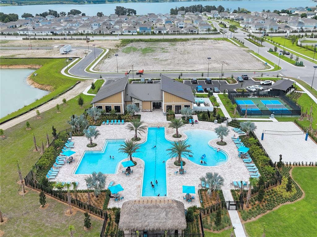 2110 Lasso Loop Eagle Lake, FL 33839 - Photo 19 of 33 an aerial view of a house with a swimming pool yard and outdoor seating