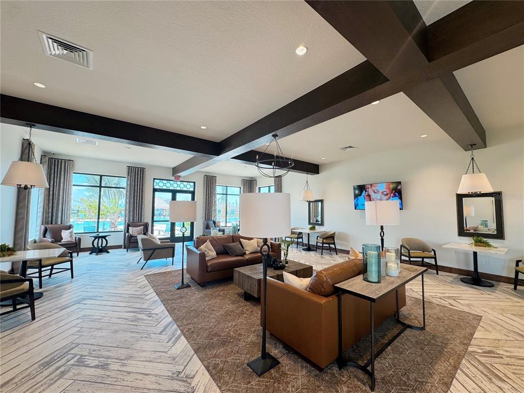 2110 Lasso Loop Eagle Lake, FL 33839 - Photo 24 of 33 a living room with furniture and a flat screen tv