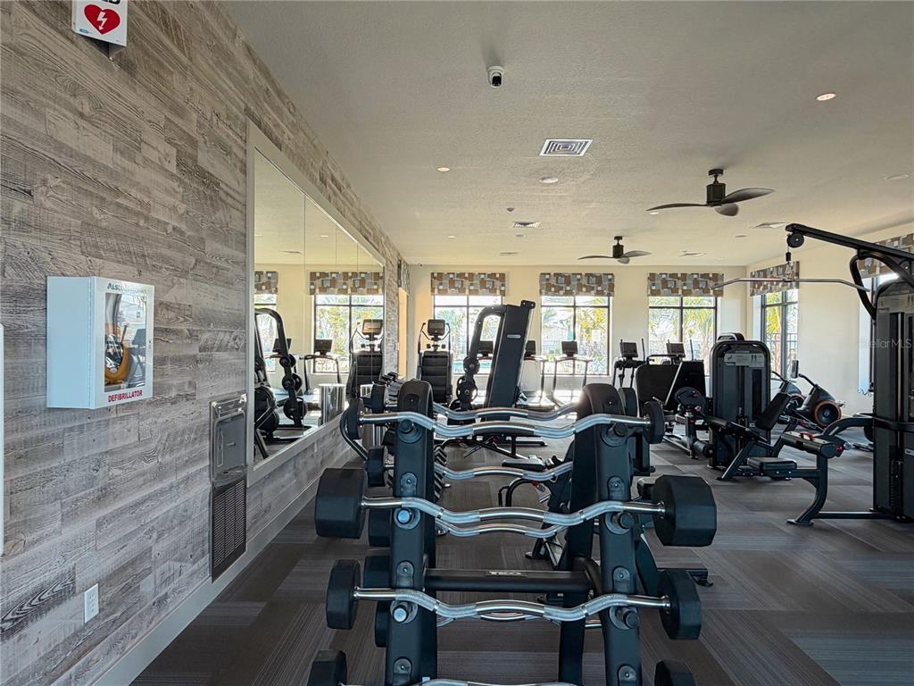 2110 Lasso Loop Eagle Lake, FL 33839 - Photo 29 of 33 a view of a room with gym equipment