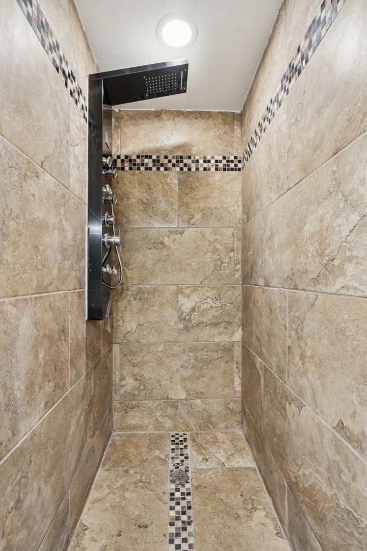 1336 East 73rd Street Chicago, IL 60619 - Photo 22 of 32 a bathroom with a shower