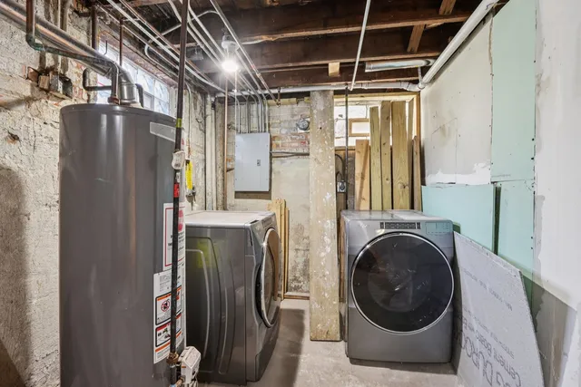 a view of a backyard with wooden fence