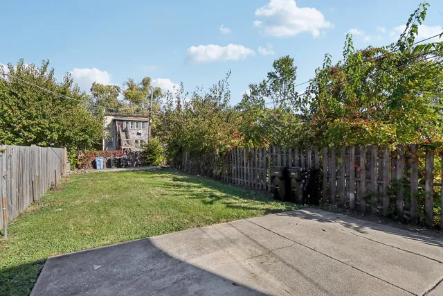 a picture of a wall with a white refrigerator