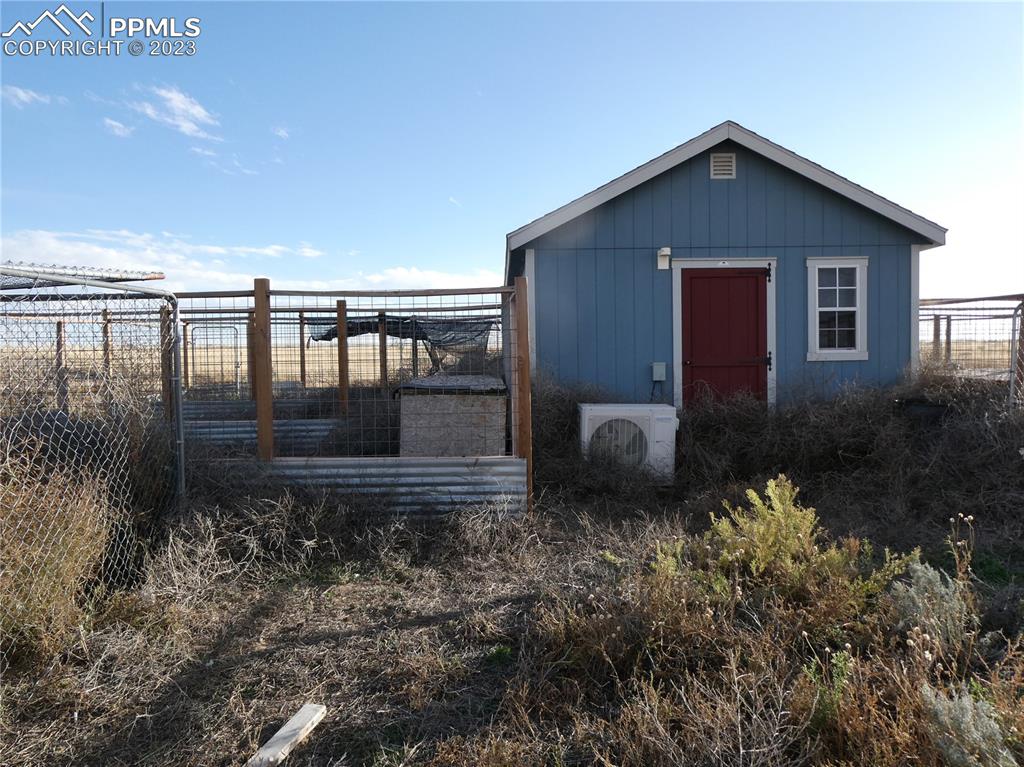 10495 Dan View Yoder, CO 80864 - Photo 11 of 33 a backyard of a house with lots of green space