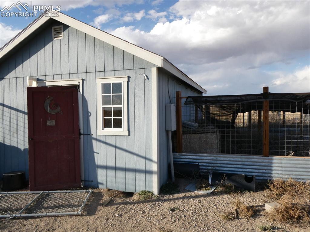 10495 Dan View Yoder, CO 80864 - Photo 12 of 33 a house view with a outdoor space