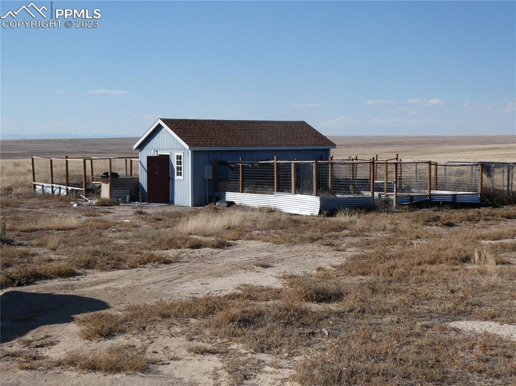 10495 Dan View Yoder, CO 80864 - Photo 14 of 33 a view of a house with a yard