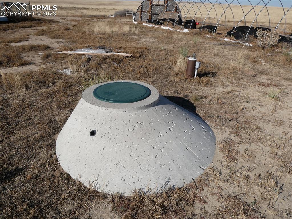 10495 Dan View Yoder, CO 80864 - Photo 24 of 33 a bathroom with a granite countertop sink and a mirror