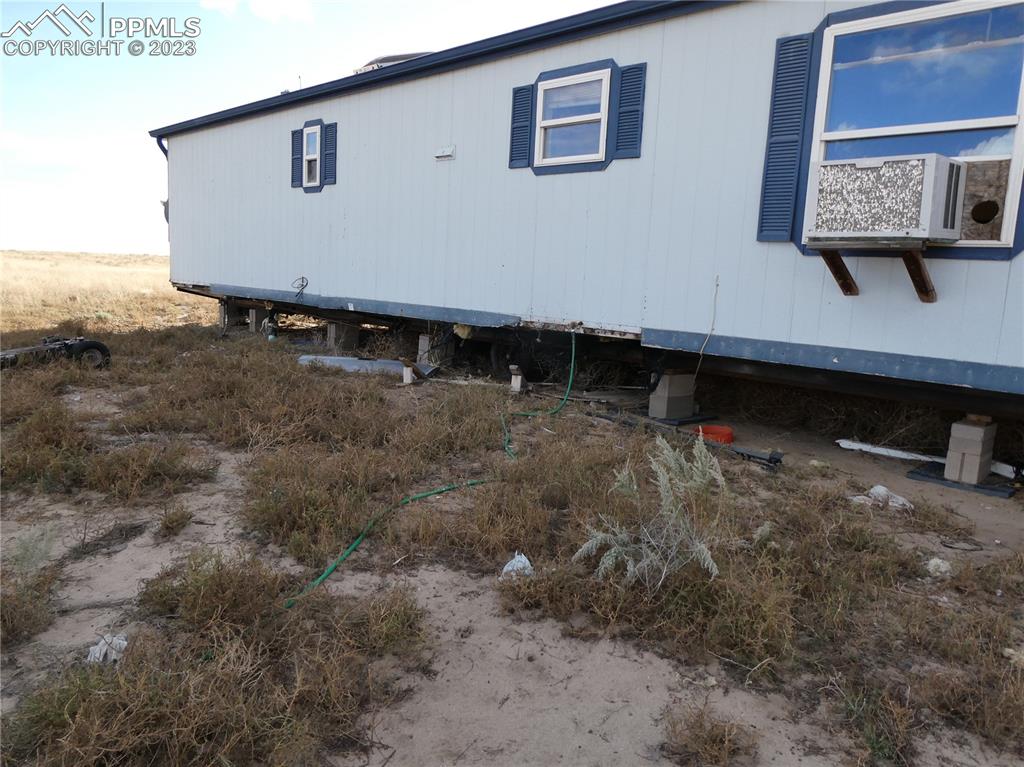 10495 Dan View Yoder, CO 80864 - Photo 7 of 33 a view of a room with rack on wall