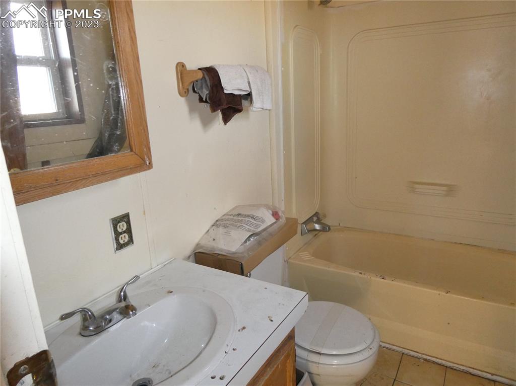 10495 Dan View Yoder, CO 80864 - Photo 10 of 33 a bathroom with a sink toilet and shower