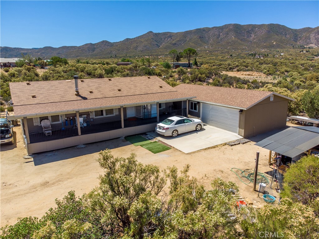 44861 Thunder Road Anza, CA 92539 - Photo 1 of 1 a view of a terrace with a lake view