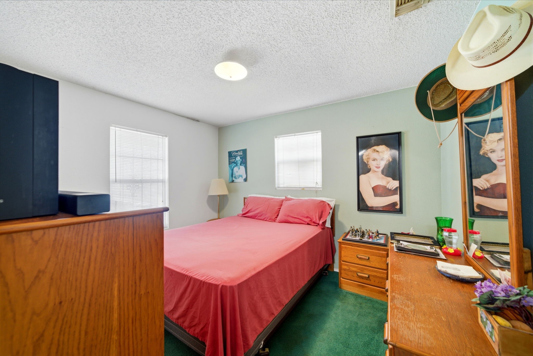 5109 Fitch Street Houston, TX 77016 - Photo 13 of 22 a bed room with a bed mirror and a window