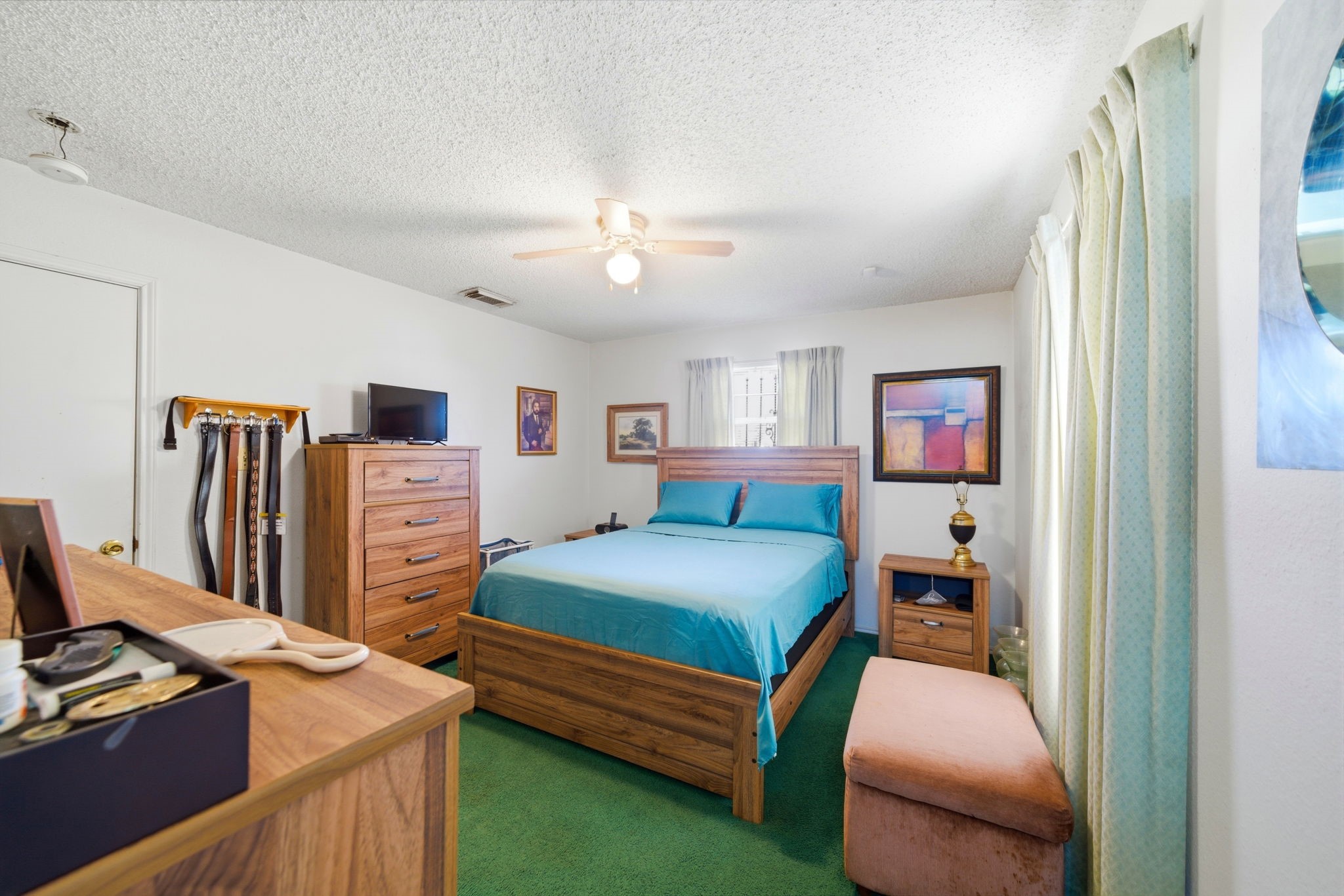 5109 Fitch Street Houston, TX 77016 - Photo 4 of 22 a bedroom with furniture and a window