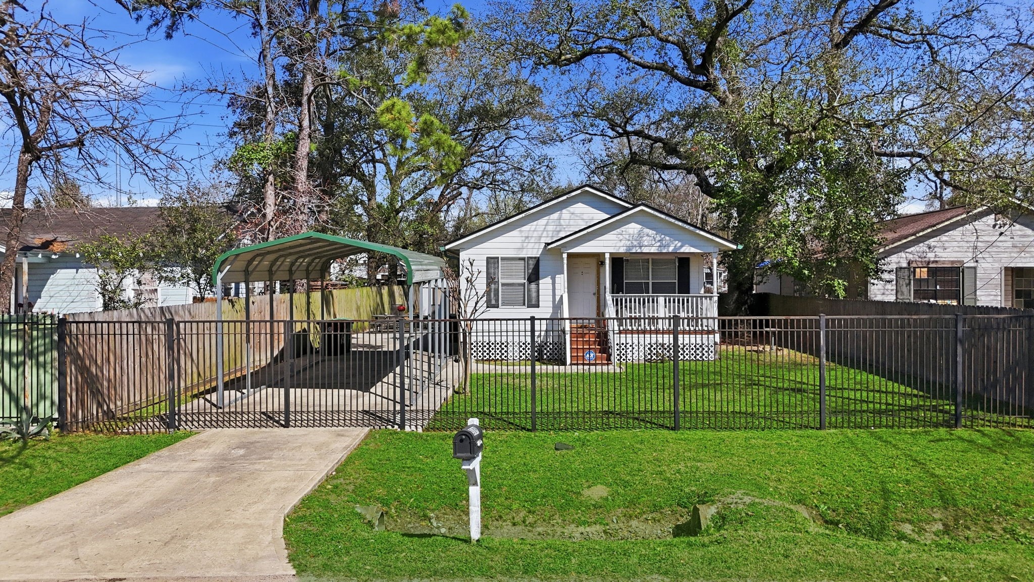 5109 Fitch Street Houston, TX 77016 - Photo 6 of 22 a front view of a house with a yard table and chairs