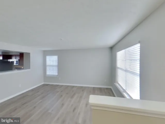 a view of a room that has a window in it