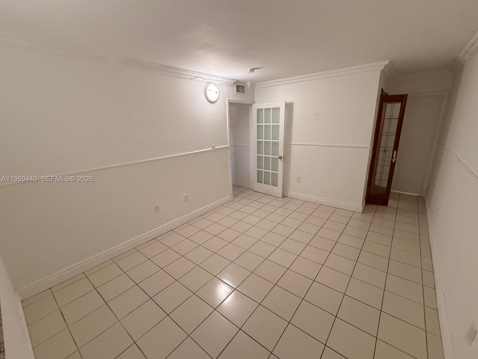 6205 Southwest 131st Court, Unit 104 Miami, FL 33183 - Photo 16 of 21 a view of empty room