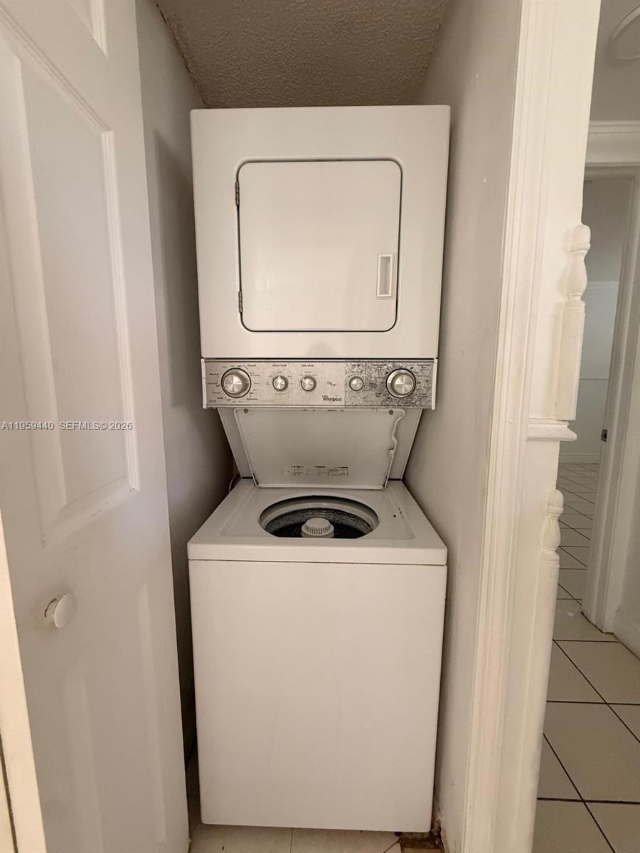 6205 Southwest 131st Court, Unit 104 Miami, FL 33183 - Photo 19 of 21 a utility room with dryer and washer