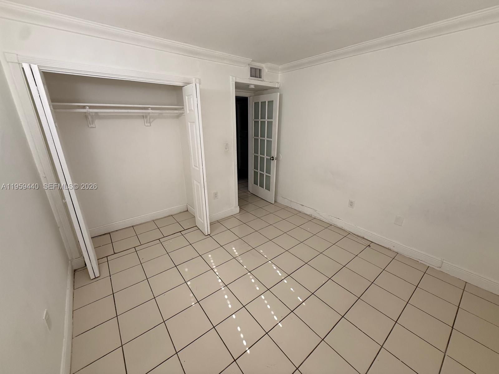 6205 Southwest 131st Court, Unit 104 Miami, FL 33183 - Photo 20 of 21 a view of an empty room