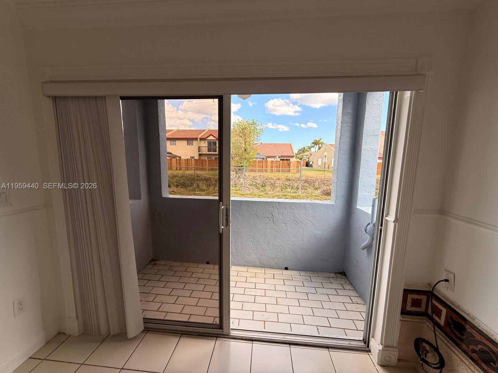 6205 Southwest 131st Court, Unit 104 Miami, FL 33183 - Photo 5 of 21 a bathroom with a window