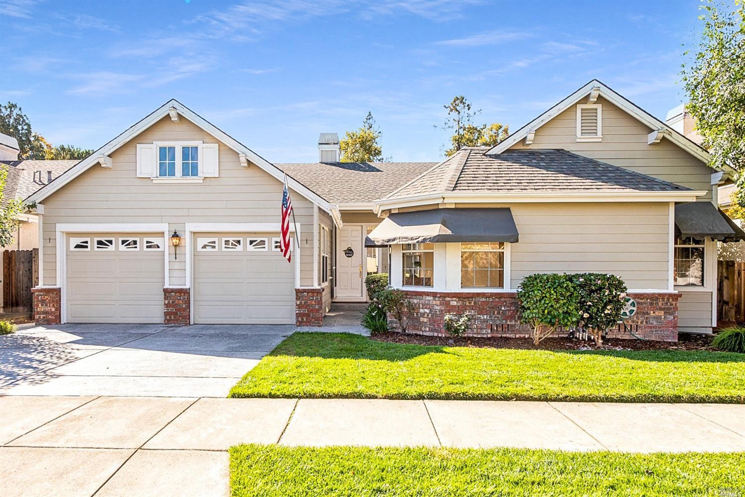 307 Breeden Street Santa Rosa, CA 95409 - Photo 1 of 1 a front view of a house with a yard and garage