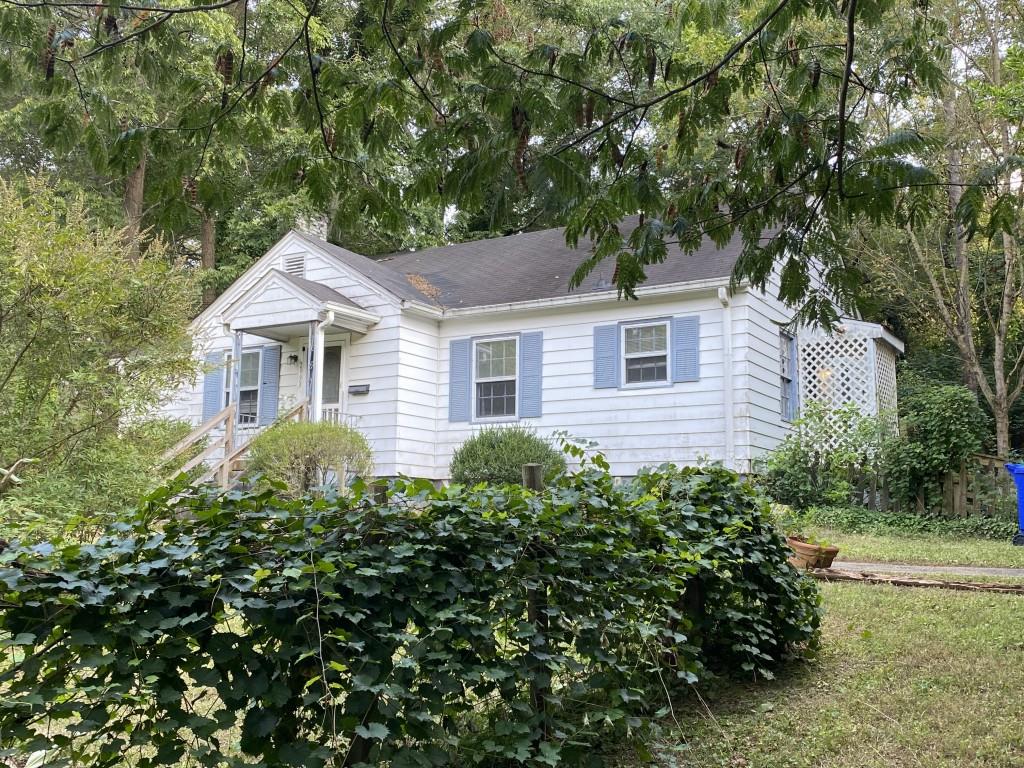 2993 Hollywood Drive Decatur, GA 30033 - Photo 1 of 1 a front view of a house with garden